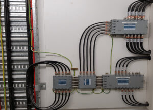 Professional data cable installation by Commercial Electrician Sydney in a commercial space.